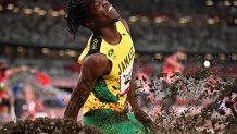 Jamaica's Tajay Gayle lands during the men's long jump qualification during the Tokyo 2020 Olympic Games at the Olympic Stadium in Tokyo on July 31, 2021.