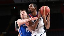 Team USA's Kevin Durant goes to the basket past Czech Republic's Ondrej Sehnal in the men's preliminary round group A basketball match between USA and Czech Republic during the Tokyo 2020 Olympic Games at the Saitama Super Arena in Saitama on July 31, 2021.