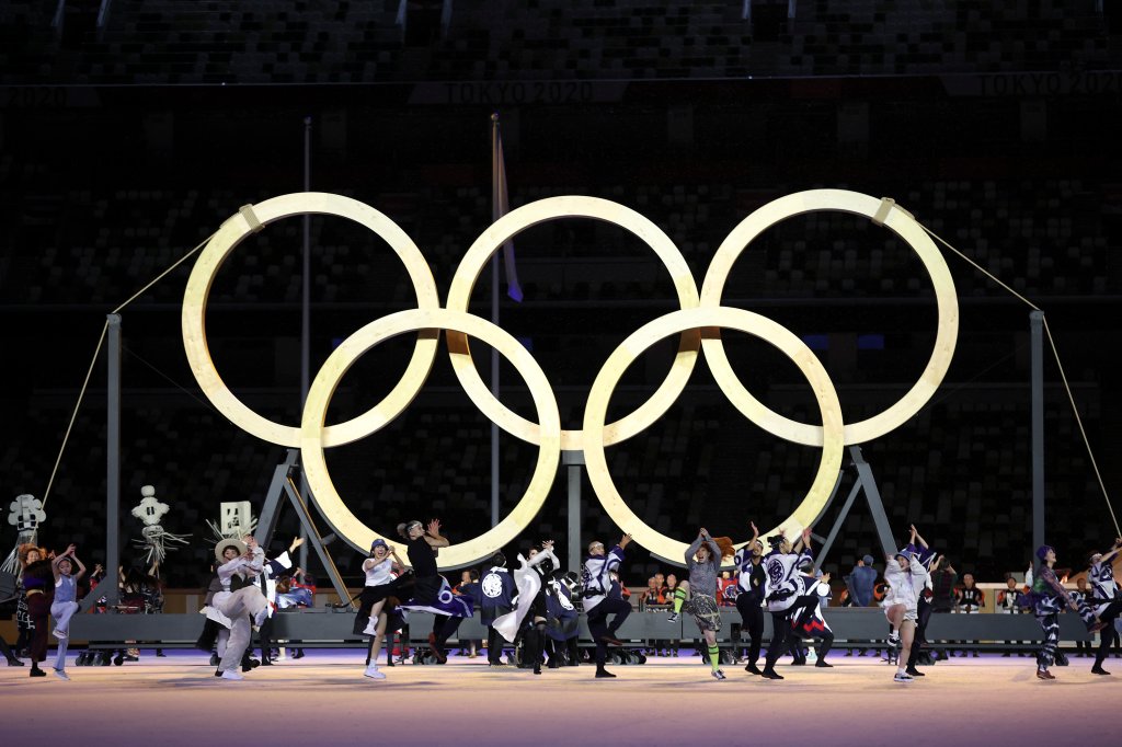 Performers dance as they assemble the Olympic Rings during the Opening Ceremony of the Tokyo 2020 Olympic Games at Olympic Stadium on July 23, 2021 in Tokyo, Japan.