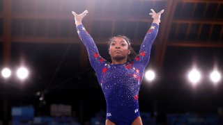 Simone Biles of Team United States competes on vault during Women's Qualification on day two of the Tokyo 2020 Olympic Games