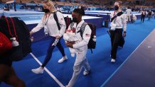 TOKYO, JAPAN - JULY 27: Simone Biles of Team United States walks off the floor during the Women's Team Final on day four of the Tokyo 2020 Olympic Games at Ariake Gymnastics Centre on July 27, 2021 in Tokyo, Japan. (Photo by Ezra Shaw/Getty Images)