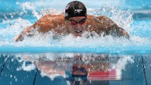 Caeleb Dressel of Team United States competes in the Men's 100m Butterfly Final at Tokyo Aquatics Centre on July 31, 2021, in Tokyo, Japan.