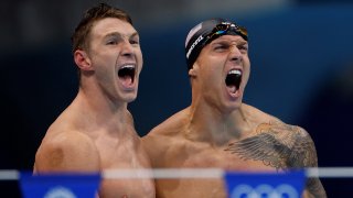 USA's Ryan Murphy (L) and Caeleb Dressel celebrate winning the final of the men's 4x100m medley relay during the Tokyo Olympics.
