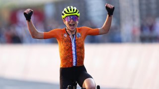 Annemiek van Vleuten of Team Netherlands celebrates crosses the finishing line