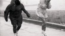 People walk into the wind in Boston during Hurricane Bob on Aug. 19, 1991.