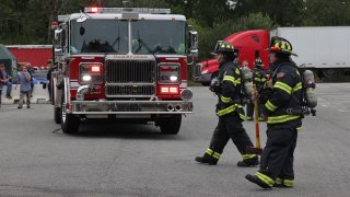 Firefighters responding to a hazardous materials call in Wakefield, Massachusetts, on Monday, Aug. 23, 2021.