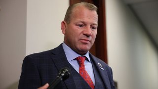 Rep. Troy Nehls (R-TX) speaks with reporters as he departs from a caucus meeting with House Republicans on Capitol Hill on July 20, 2021 in Washington, DC.