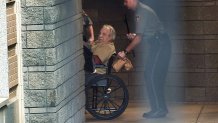 Robert Gentile is brought into the federal courthouse in a wheelchair on Monday, April 20, 2015, for a continuation of a hearing that was held Friday after Gentile was arrested after selling a gun to an undercover agent.