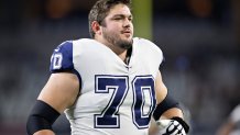 Zack Martin #70 of the Dallas Cowboys warms up before a game against the Washington Redskins at AT&T Stadium in Arlington, Texas.