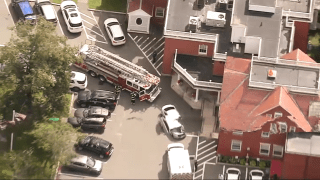 First responders at the scene of a forklift accident in Swampscott, Massachusetts, on Friday, Sept. 3, 2021.