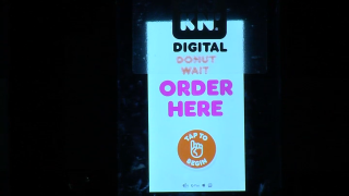 A sign at the Dunkin' Digital restaurant in Boston's Beacon Hill