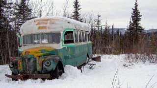 FILE - In this March 21, 2006, file photo, is the abandoned bus where Christopher McCandless starved to death in 1992 near Healy, Alaska. The bus that people sometimes embarked on deadly pilgrimages to Alaska’s backcountry to visit can now safely be viewed at the University of Alaska Fairbanks while it undergoes preservation work. The bus was moved to the university's engineering facility in early Oct. 2021, while it's being prepared for outdoor display at the Museum of the North, Fairbanks television station KTVF reported.