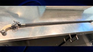 A rifle-cane seized at Boston Logan International Airport on Tuesday, Oct. 19, 2021.