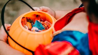 A trick-or-treater on Halloween.