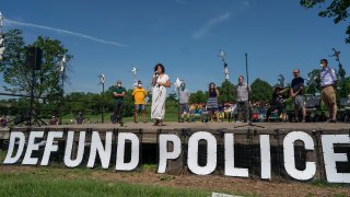 Alondra Cano, Minneapolis City Council 9th Ward member, spoke to community members at "The Path Forward" meeting at Powderhorn Park, Minneapolis, MN