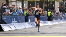 BOSTON, MASSACHUSETTS - OCTOBER 11: Colin Bennie of the United States nears the finish line during the 125th Boston Marathon on October 11, 2021 in Boston, Massachusetts. (Photo by Maddie Meyer/Getty Images)