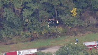 Wreckage from a car crash in Hopkinton, Massachusetts, on Thursday, Oct. 7, 2021.