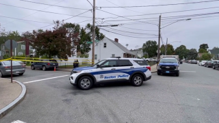 Boston police at the scene of a shooting in Hyde Park on Sunday, Oct. 10, 2021.