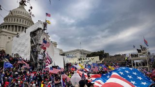 Trump supporters clash with police and security forces as people try to storm the US Capitol on January 6, 2021 in Washington, DC. Demonstrators breeched security and entered the Capitol as Congress debated the 2020 presidential election Electoral Vote Certification.