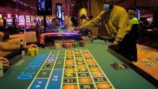 A dealer conducts a game of roulette in Bally's casino in Atlantic City, N.J.