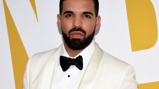 FILE - In this June 26, 2017, file photo, Canadian rapper Drake arrives at the NBA Awards in New York. Drake is going on tour. He announced the Aubrey and The Three Amigos tour on Monday, May 14, 2018. Drake will be joined by “Walk It Talk It” collaborators Migos and special guests on the North American leg through the summer and fall.