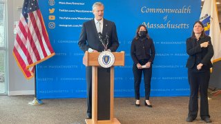 Gov. Charlie Baker speaks to the media on Friday, Dec. 3, 2021, after receiving his COVID booster shot.