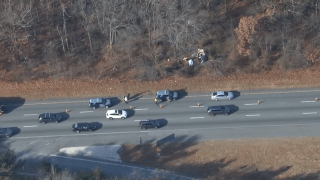 Police at the scene of a deadly crash on I-95 in Mansfield, Massachusetts.