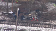 A crashed vehicle that appeared to have been involved in an incident with an Amtrak train near Haverhill, Massachusetts, Monday, Dec. 27, 2021.
