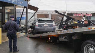 A car that crashed into a tent for coronavirus testing at Lawrence Memorial Hospital on Tuesday, Dec. 28, 2021.