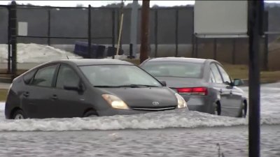 Storm Causes Flooding in NH; Cars Covered in Sand at Hampton Beach
