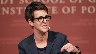 FILE - In this Oct. 16, 2017 file photo, MSNBC television anchor Rachel Maddow, host of "The Rachel Maddow Show," moderates a panel at a forum called "Perspectives on National Security," at the John F. Kennedy School of Government, at Harvard University, in Cambridge, Mass. MSNBC's Rachel Maddow said Friday, Nov. 6, 2020 she is quarantining after being in contact with someone who tested positive for the coronavirus. Maddow said on social media that she tested negative so far for COVID-19 but plans to remain at home until it's “safe for me to be back at work without putting anyone at risk.”