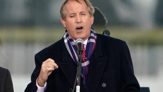 FILE - In this Jan. 6, 2021, file photo, Texas Attorney General Ken Paxton speaks in Washington, at a rally in support of President Donald Trump. The Supreme Court, though increasingly conservative in makeup, rejected the latest major Republican-led effort to kill the national health care law known as "Obamacare" on Thursday, preserving insurance coverage for millions of Americans. Paxton pledged to continue the fight against "Obamacare," which he called a "massive government takeover of health care."