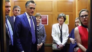 (L-R) U.S. Sens. Mark Warner (D-VA), Joe Manchin (D-WV), Mitt Romney (R-UT), Jeanne Shaheen (D-NH), Susan Collins (R-ME) and Kyrsten Sinema (D-AZ)