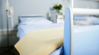 An empty hospital bed Getty Images
