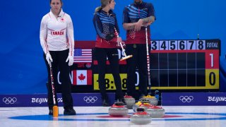 Canada's Rachel Homan, looks at her team mate, during the mixed doubles match against the United States, at the 2022 Winter Olympics, Saturday, Feb. 5, 2022, in Beijing.