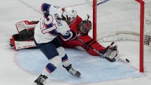 United States' Hilary Knight scores