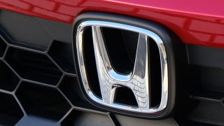The emblem of Japan's Honda Motor is displayed on a vehicle