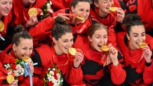 Gold medallist Canada team players celebrates gold at the victory ceremony for the gold medal Women's Ice Hockey match between Canada and the United States at the 2022 Winter Olympic Games, Feb. 17, 2022, in Beijing.