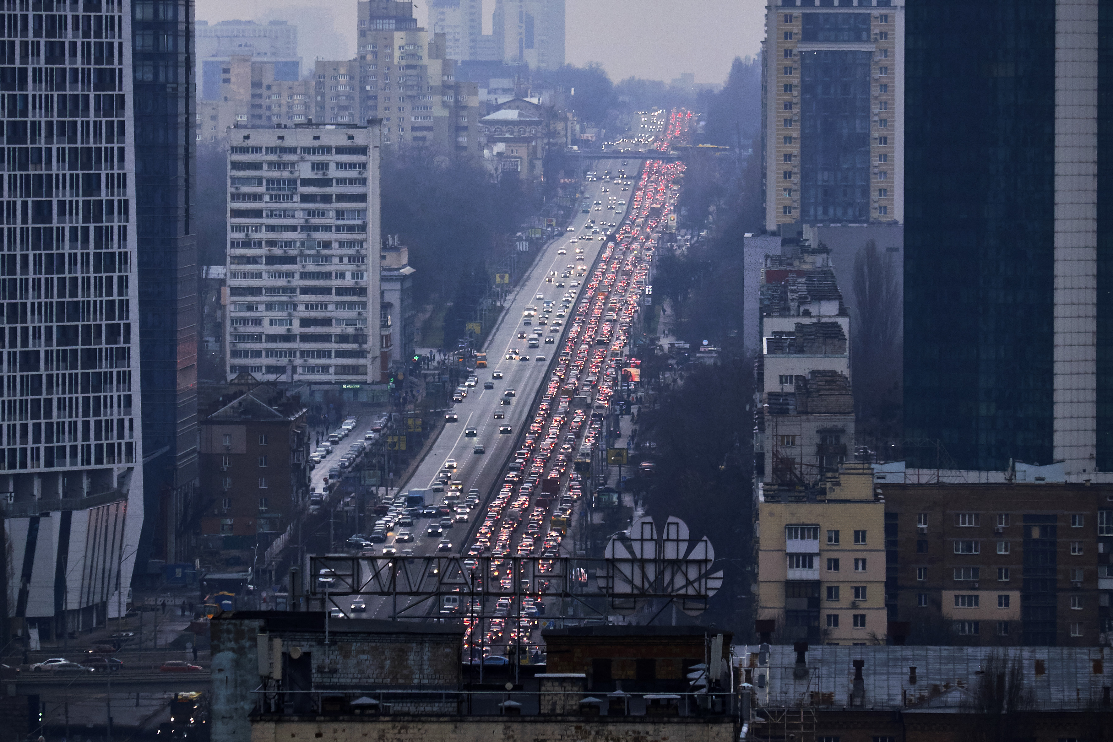 Inhabitants of Kyiv leave the city following pre-offensive missile strikes of the Russian armed forces and Belarus, Feb. 24, 2022, in Kyiv, Ukraine. Overnight, Russia began a large-scale attack on Ukraine, with explosions reported in multiple cities and far outside the restive eastern regions held by Russian-backed rebels.