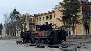 A Ukrainian armored personnel carrier (APC) BTR-4 destroyed as a result of fight not far from the center of Kharkiv, Ukraine, Feb. 28, 2022, a little over 30 miles from the Russian-Ukrainian border.