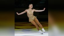 Michelle Kwan performs in the Jan. 13, 2002 U.S. Figure Skating Championships in Los Angeles, California, wearing a costume designed by Vera Wang.