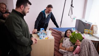 Ukrainian President Volodymyr Zelenskyy visits wounded people at hospital