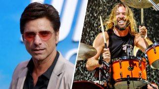 John Stamos paid tribute to his late friend Taylor Hawkins, sharing the last text and the last video message Hawkins made for his friend after the Foo Fighter drummer died on March 25.