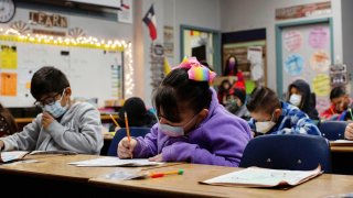 Students attend a class, as returning to schools with coronavirus disease (COVID-19) prevention measures began, in San Antonio, Texas, U.S., January 11, 2022.