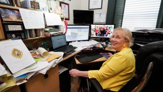 Elaine Powell, president of the Central Florida Genealogical Society at her home office Wednesday, March 30, 2022, in Orlando, Fla. She plans to study the 1950 Census on its release at midnight on April 1.