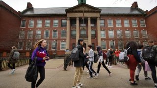 BOSTON, MA – MARCH 13: Students at Boston Latin Academy in Boston leave at the end of the school day, March 13, 2020. The coronavirus outbreak caused Boston Public School officials to decide to close the district’s schools until the end of April. (Photo by Barry Chin/The Boston Globe via Getty Images)