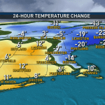 A map showing the 24-hour change in temperature across New England, with some areas in Maine dropping 20 degrees or more, while temperatures in the south and west of the region rose, in some spots by 10 degrees or more.