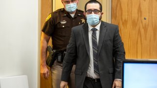 Armando Barron enters a courtroom at the Cheshire County Superior Court, Thursday, May 26, 2022, in Keene, N.H