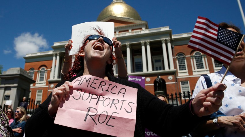 Jane Marcus of Medford chants during a rally held outside of the Massachusetts State House in Boston to protest restrictive abortion laws recently passed in several states on May 21, 2019.