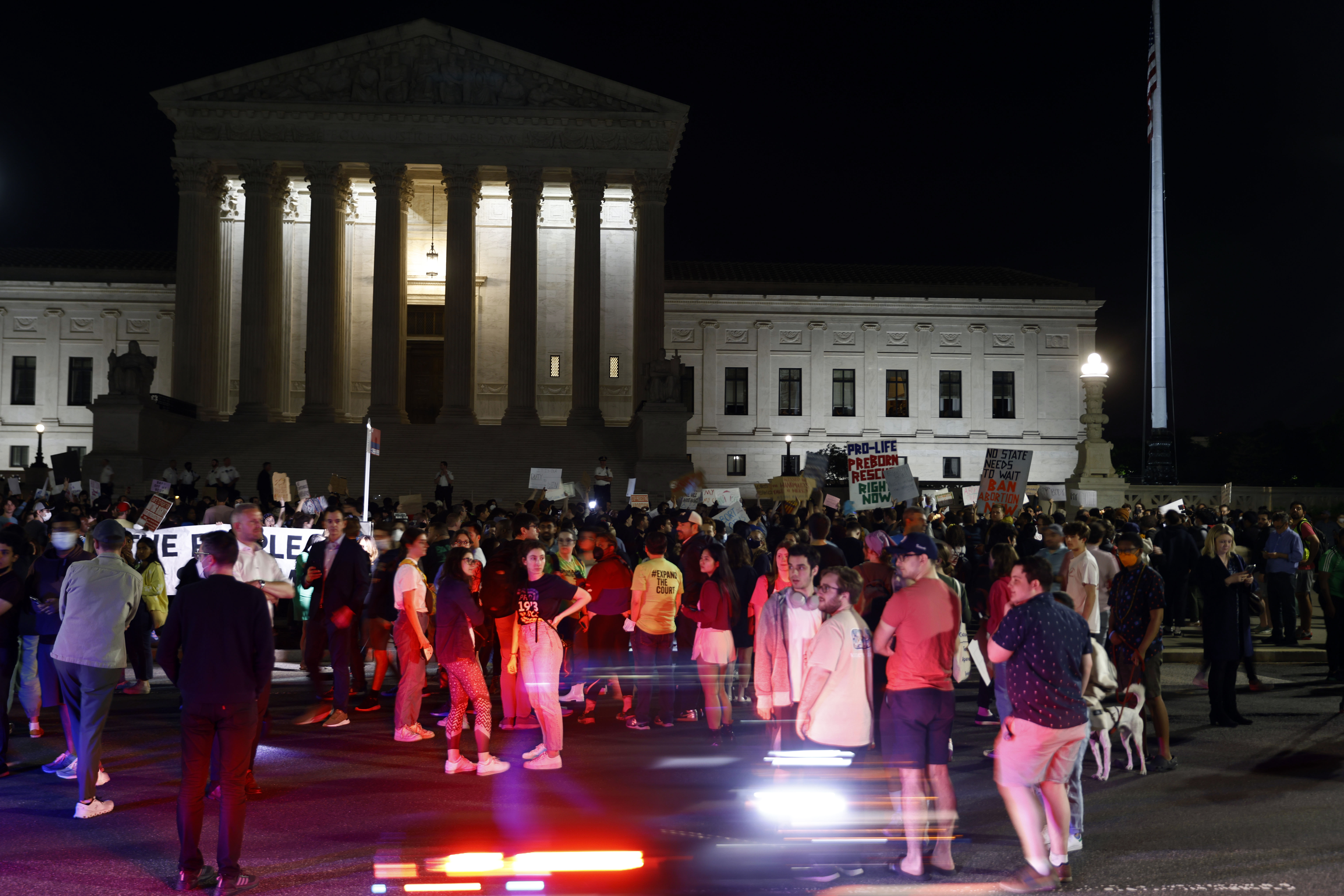 Demonstrators outside the U.S. Supreme Court in Washington, D.C., U.S., early on Tuesday, May 3, 2022. Abortion rights suddenly emerged as an issue that could reshape the battle between Democrats and Republicans for control of Congress, following a report that conservatives on the U.S. Supreme Court were poised to strike down the half-century-old Roe v. Wade precedent. Photographer: Ting Shen/Bloomberg via Getty Images